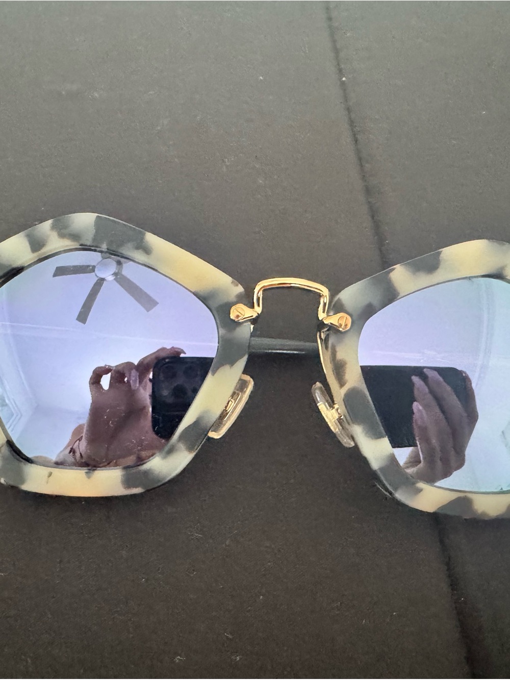 Miu Miu Tortoiseshell Frame Sunglasses with Blue Lenses and Gold Bridge